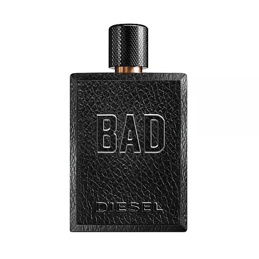 Diesel Bad herrparfymflaska i svart och guld på träbord