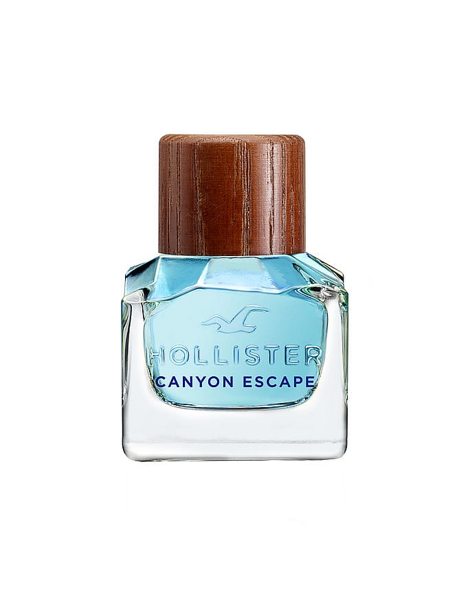 Herrparfymflaska Hollister Canyon Escape på träbord