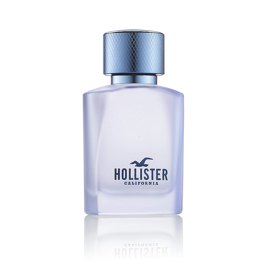 Stilren Hollister Free Wave herrparfymflaska i modern design mot en neutral bakgrund