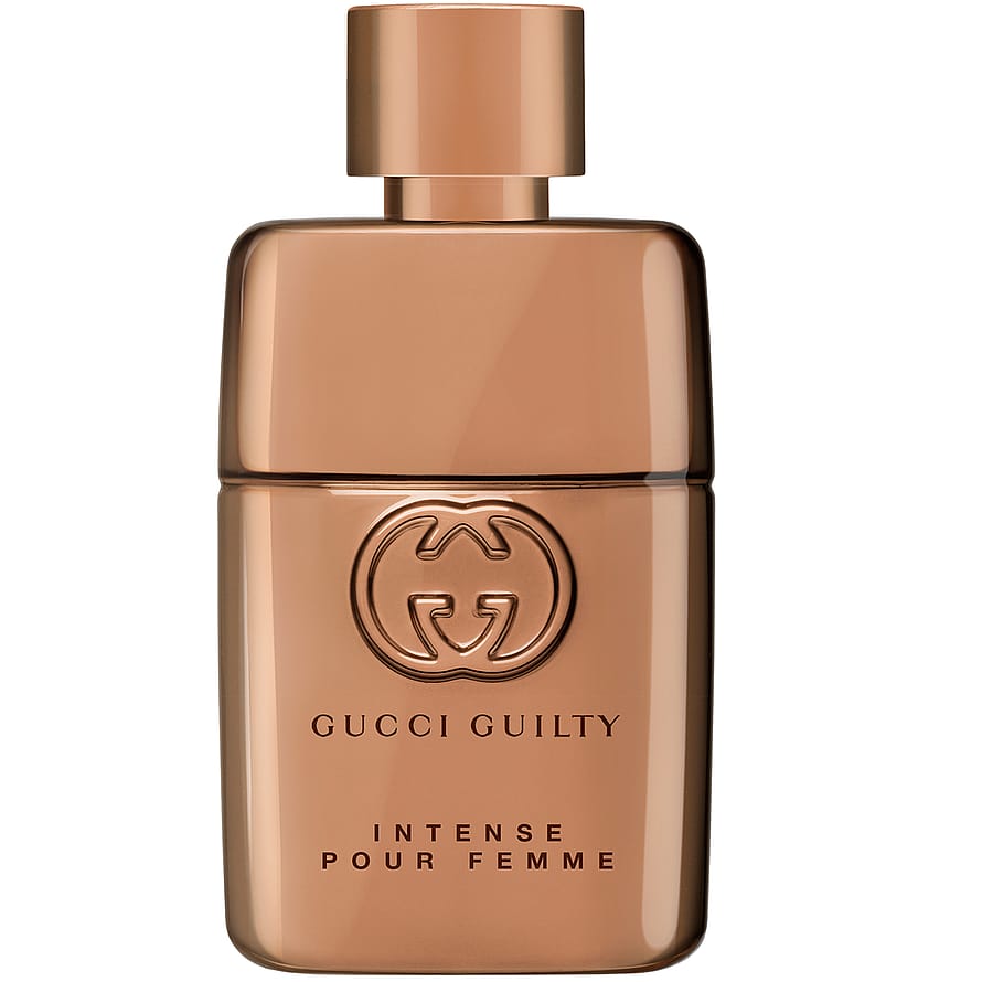 Gucci Guilty Intense damparfymflaska i guld på mörk bakgrund