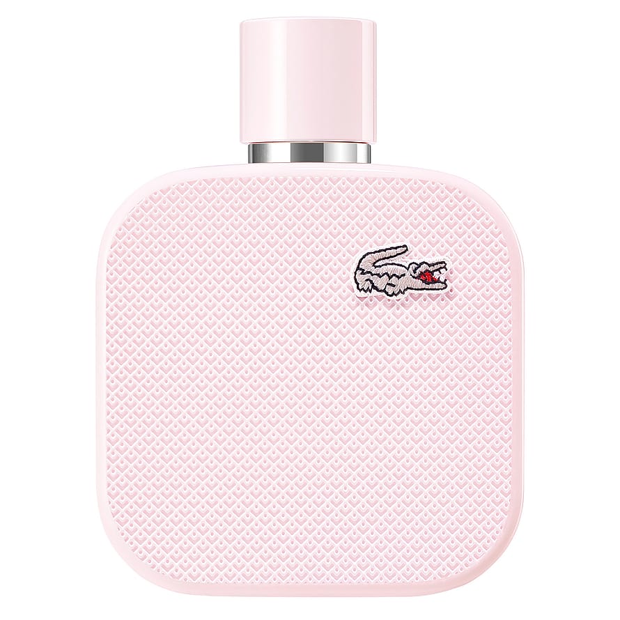 Lacoste L.12.12 Rose parfymflaska för damer mot ljus bakgrund