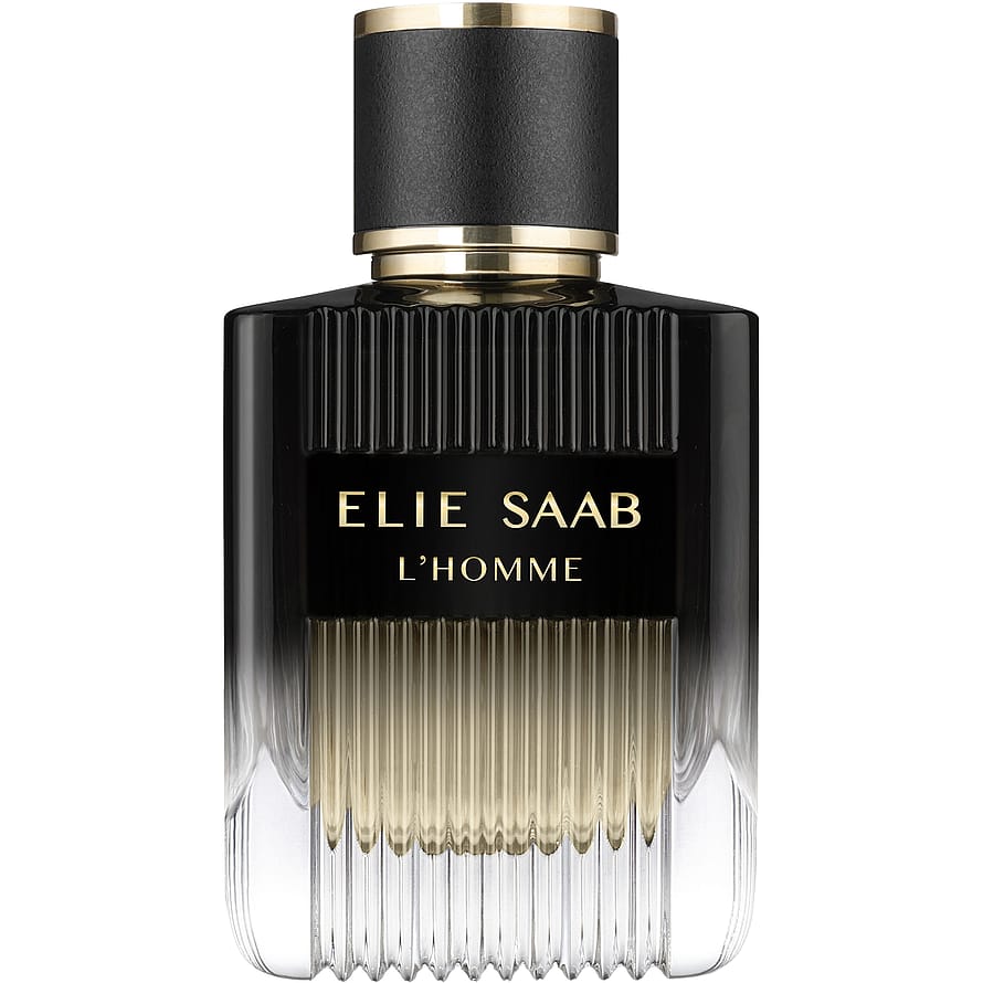 Klassisk Yves Saint Laurent La Nuit de L'Homme herrparfymflaska mot mörk bakgrund