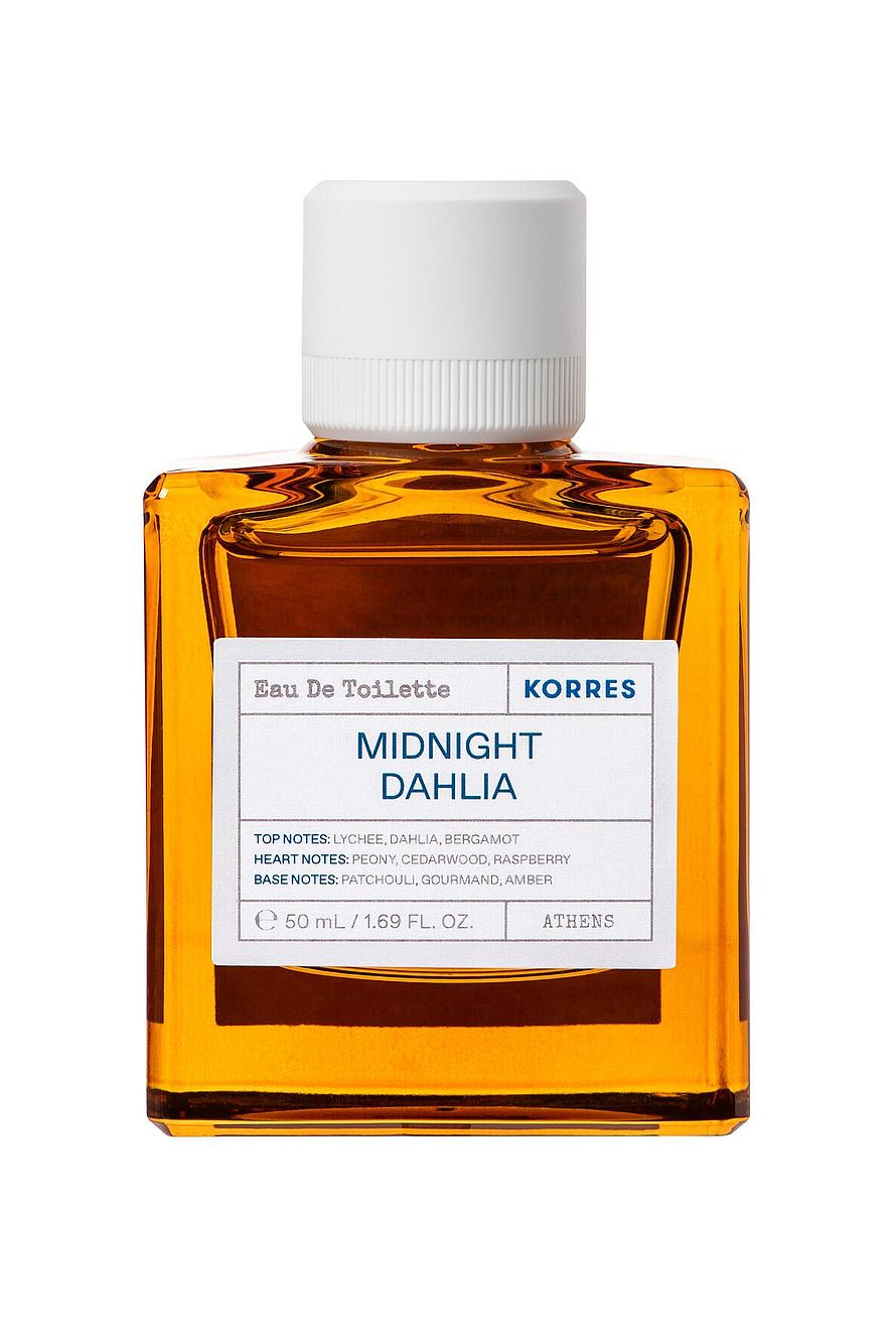 Klassisk parfymflaska Korres Midnight Dahlia för damer mot mörk bakgrund