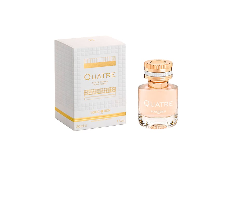 Gyllene parfymflaska med Boucheron Quatre Iconic damparfym
