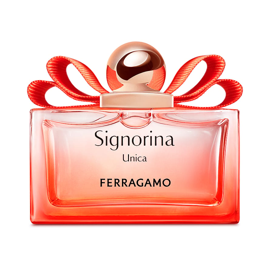 Lyxig Ferragamo Signorina Unica parfymflaska mot ljus bakgrund