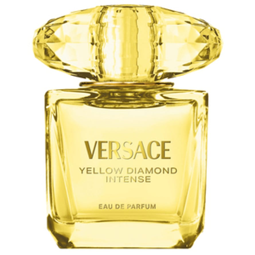 Gul parfymflaska Versace Yellow Diamond Intense för damer på vit bakgrund
